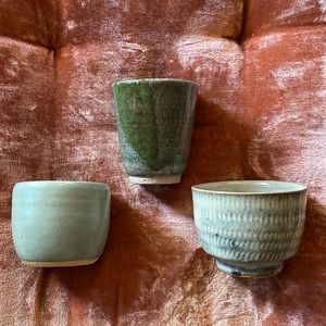 Set of three small hand thrown ceramic green cups